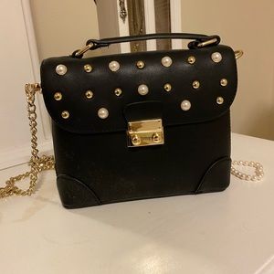 Black Express mini shoulder bag with pearl studs
